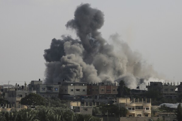 FILE - Smoke rises from an explosion caused by Israeli airstrikes on the border between Egypt and Rafah, Gaza Strip, Tuesday, Oct. 10, 2023. As Israeli warplanes pummel Gaza to avenge the Hamas attack, Palestinians say the military has largely unleashed its fury on civilians. (AP Photo/Hatem Ali, File)